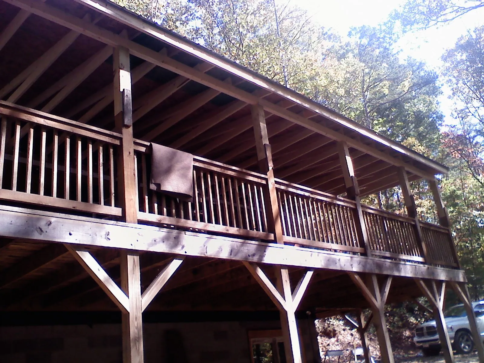 Timber framing under a new elevated porch and deck — Roof Leak Repair in Enterprise by Roofing Brothers